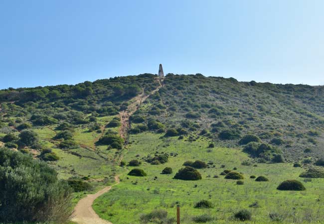 marker at the top of the hill